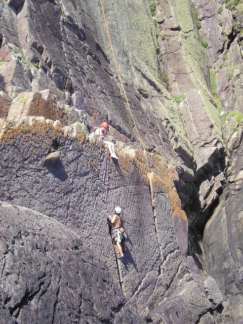 Ian climbing up to Cathy's belay position