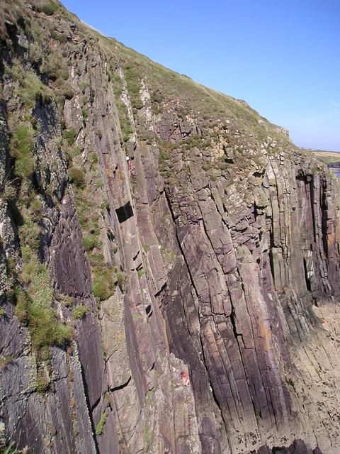 Ian climbing and Cathy belaying
